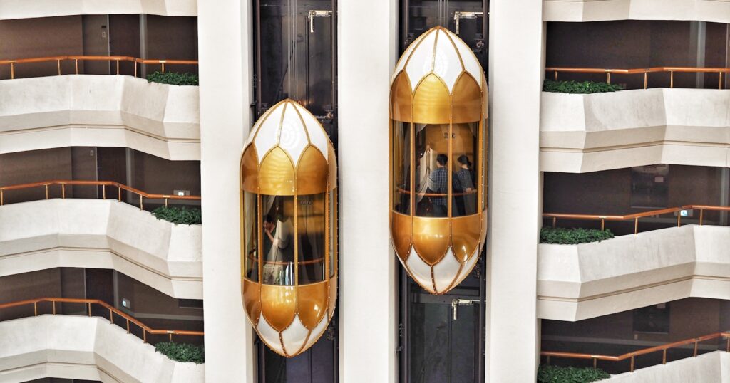 A pair of lifts serving the same lobby