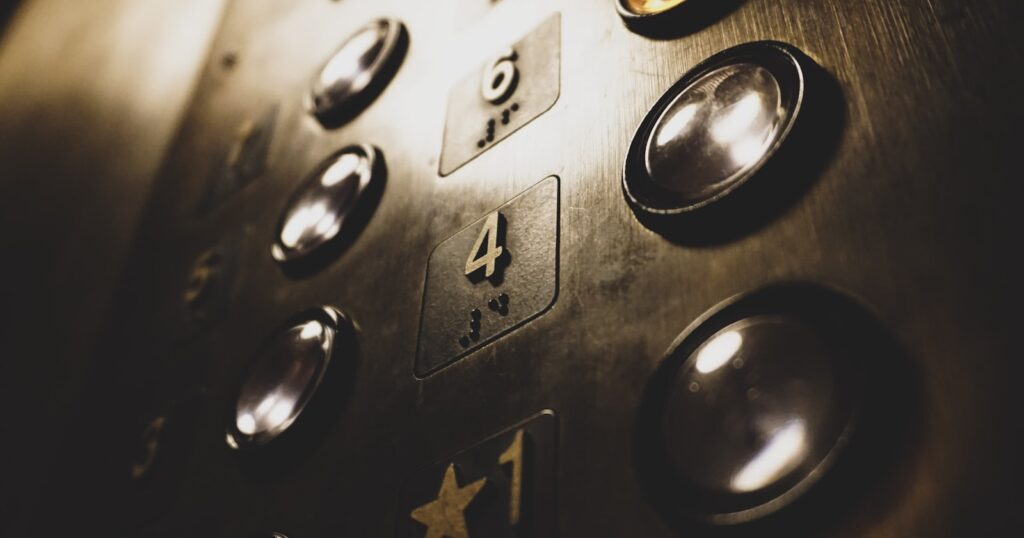 Close up of lift landing call buttons